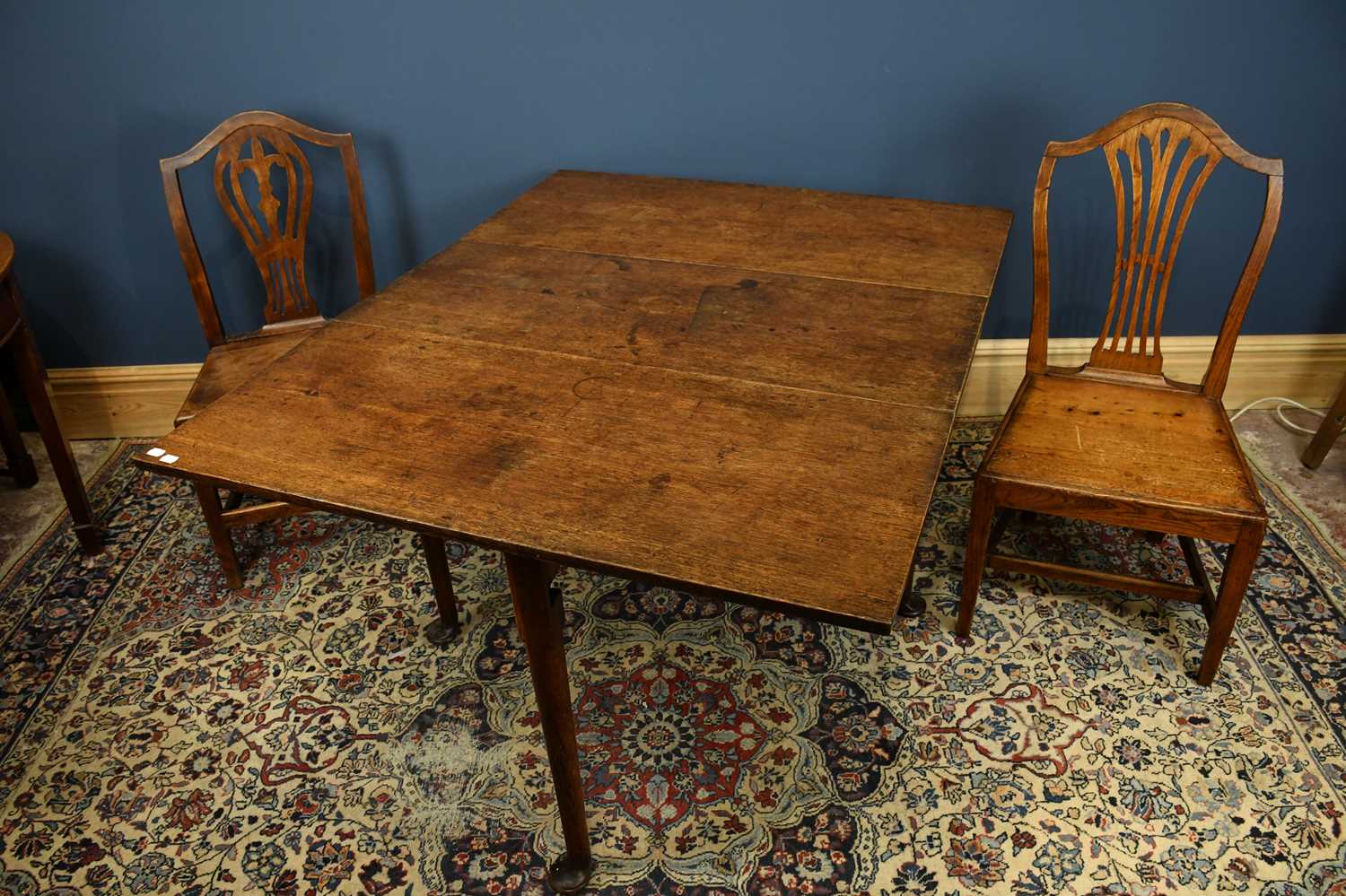 A George III oak drop-leaf dining table, on tapered legs and pad feet, height 72cm, length 106cm, - Image 3 of 6