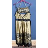 TED BAKER; a gold and black 100% silk midi dress, unworn with original tags, with thin shoulder