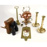 A pair of 19th century brass ejector candlesticks, height 29cm, a brass door stop, a copper kettle