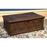 An 18th century oak bible box, with later carved detailing and additional tray to the interior,