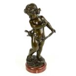 AFTER VALENTINO BESAREL (1829-1902); bronze figure of a putti with a bird by his waist and raised on