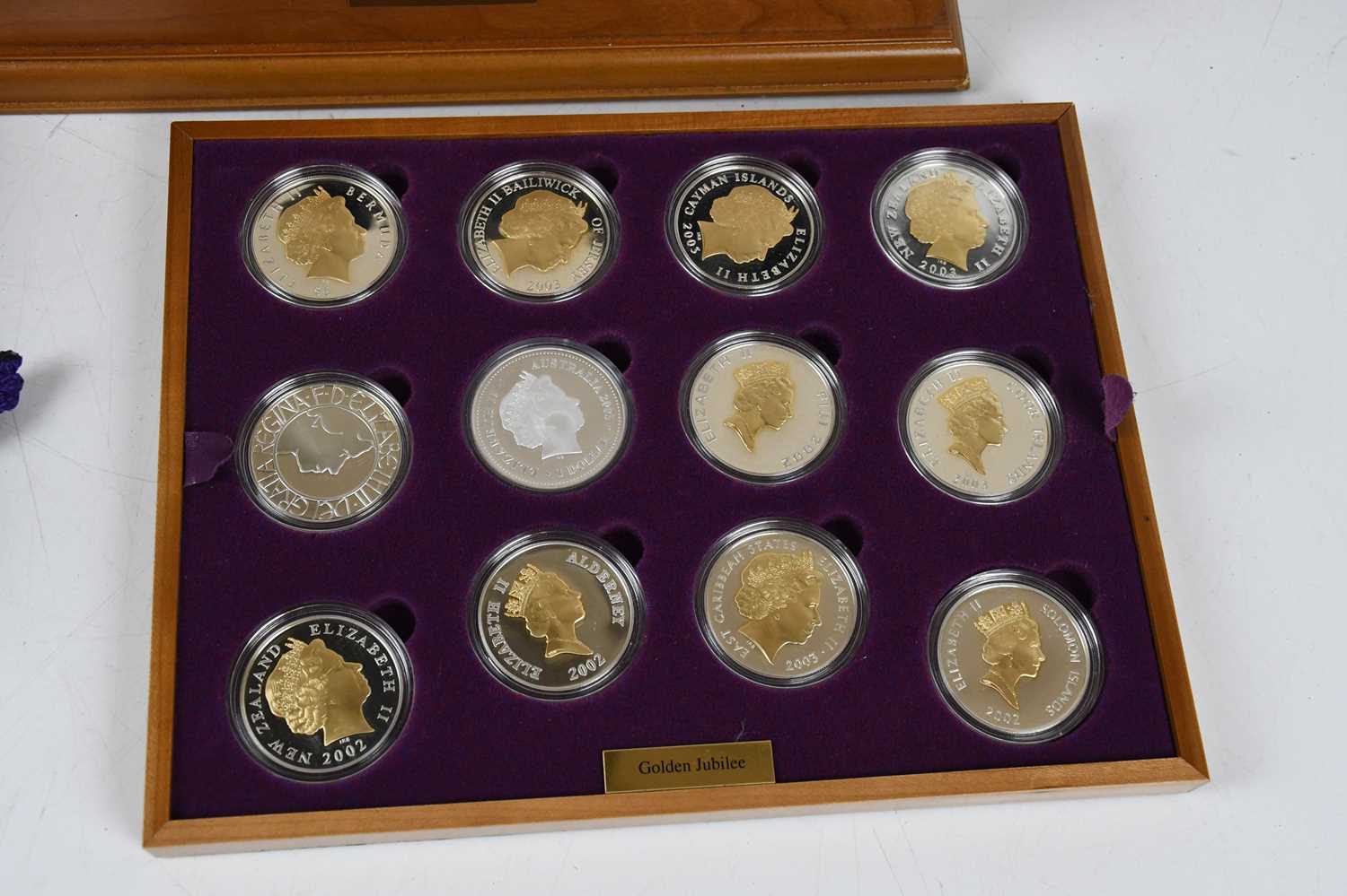 ROYAL MINT; Queen Elizabeth II Golden Jubilee Collection, a cased set of twenty-four commemorative - Image 2 of 3