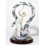 LLADRO MILLENNIUM INSPIRATION; a large figure group, no.6571, modelled as a maiden with an infant