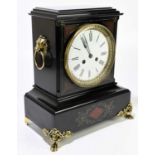 A Victorian slate and marble mantel clock, with gilt metal mounts and highlights surrounding the