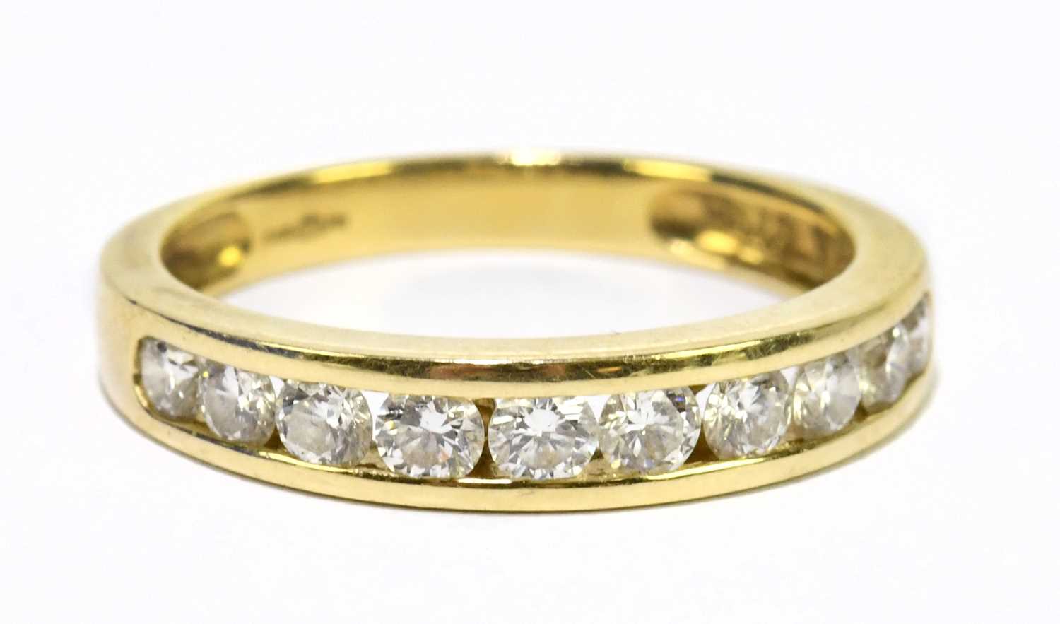 An 18ct yellow gold and diamond half eternity ring set with ten round brilliant cut diamonds