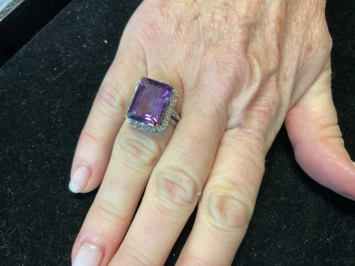 A 9ct yellow gold ring set with large emerald cut amethyst, size N 1/2, approx. 4.78g. - Image 3 of 3