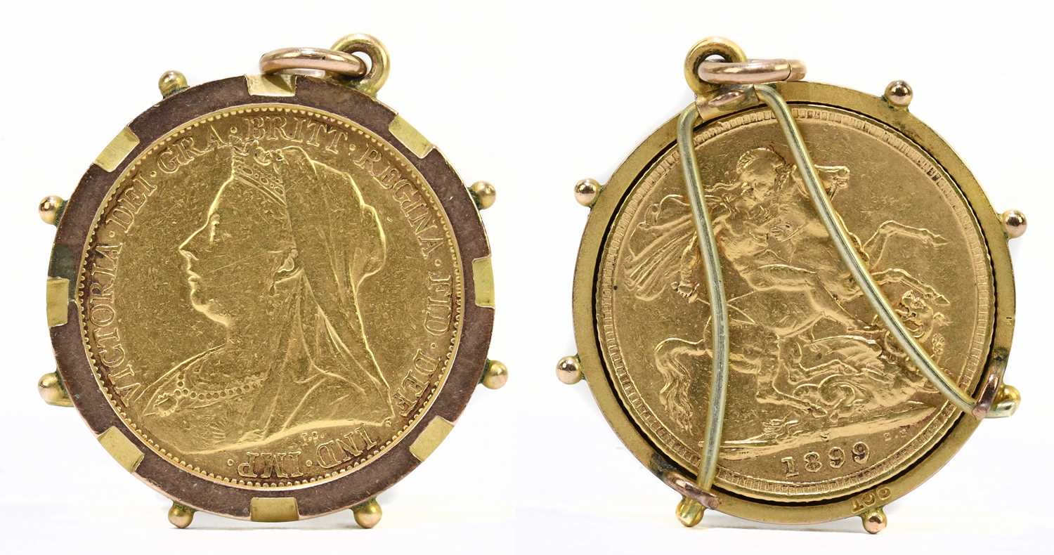 A Victoria full sovereign, 1899, old head, Sydney Mint, in yellow metal frame.