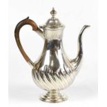 MACKAY & CHISHOLM; a Victorian hallmarked silver pedestal coffee pot with gadrooned decoration to