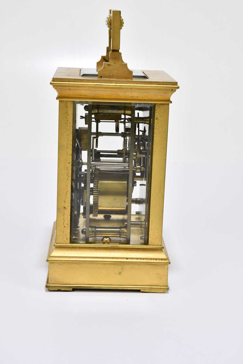 A late 19th century French brass cased carriage clock with swing loop handle above silvered dial set - Image 2 of 6