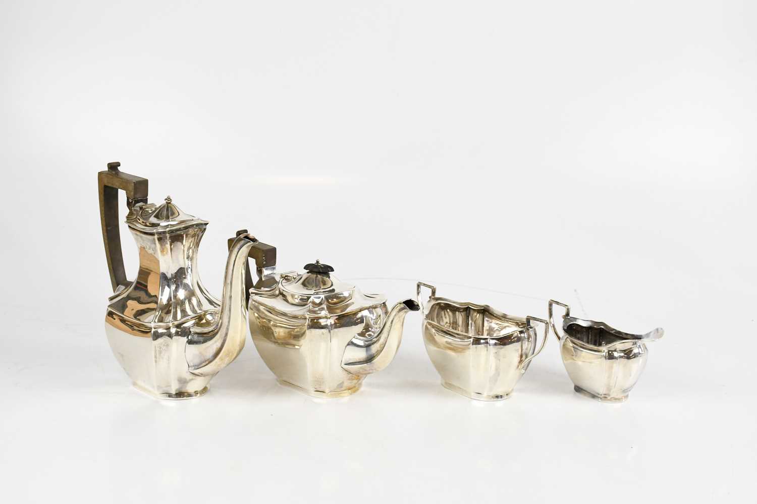 KEIGHT & CO; a hallmarked silver four piece tea service comprising teapot, water pot, milk jug and - Image 2 of 4