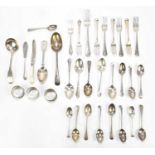 A quantity of mixed hallmarked silver cutlery to include tea spoons, dessert spoons, a ladle,