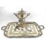 A silver plated twin handled tray, the handles and border cast with fruiting vines, length 68cm, and