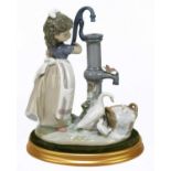 LLADRO; a figure of a girl by a water pump with ducks, height 23.5cm, on an oval base.Condition