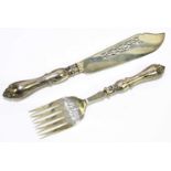 ALLEN & DARWIN; a pair of Edward VII hallmarked silver fish servers with pierced and scrolling