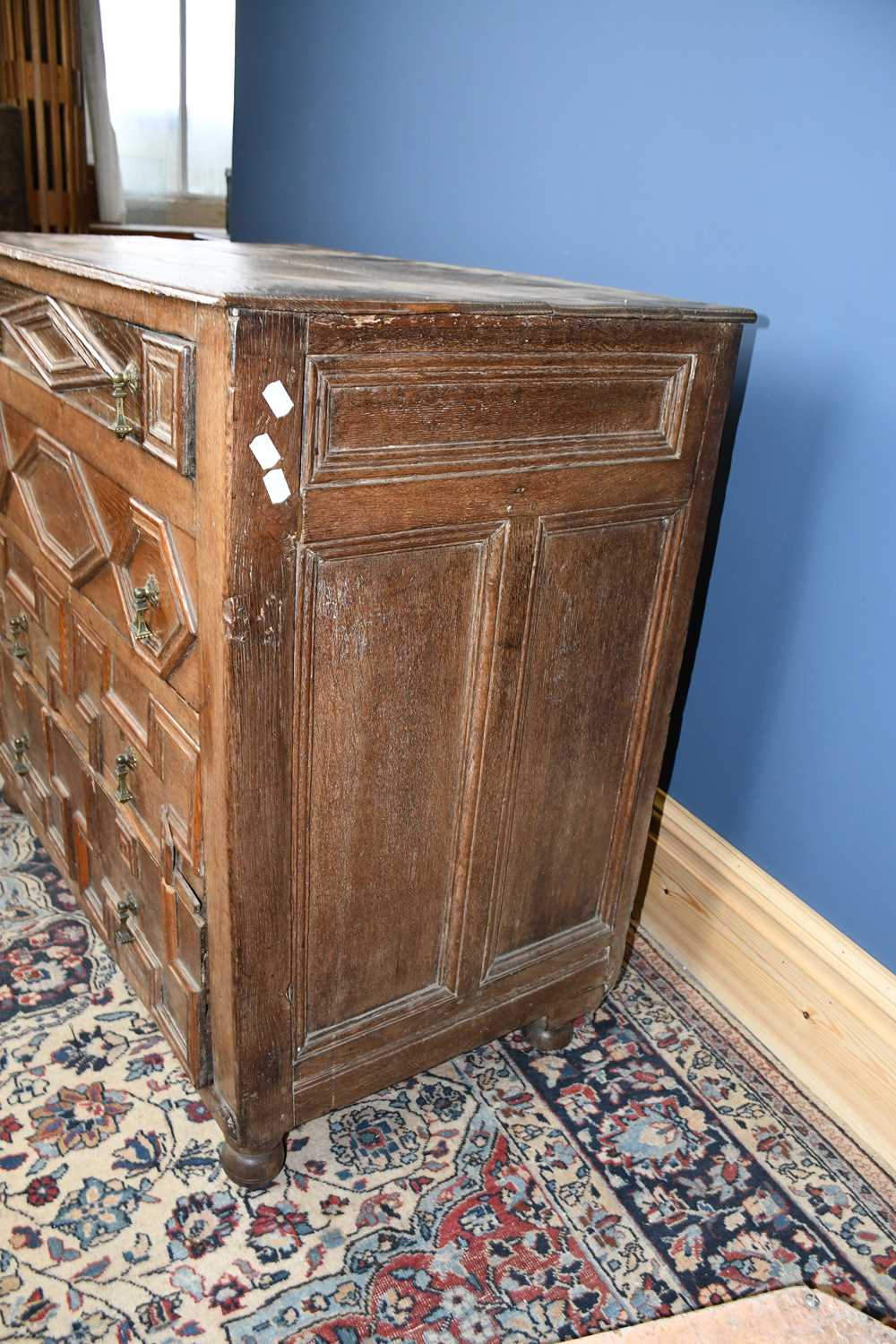 A 17th century and later oak chest, with four fielded panelled long drawers, on turned feet, - Image 5 of 5