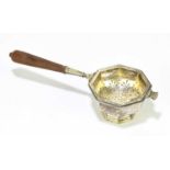 ASPREY & CO; an Elizabeth II hallmarked silver tea strainer and bowl of octagonal form, with