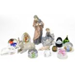 NAO; four nativity figures including Joseph, Mary and Jesus, with a selection of paper weights