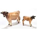 BESWICK; a Jersey cow Champion Newton Tinkle, model 1345, with calf (2)Condition Report: Light