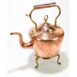 A brass and copper kettle, stamped to the underside 'S&S', together with brass stand, height on