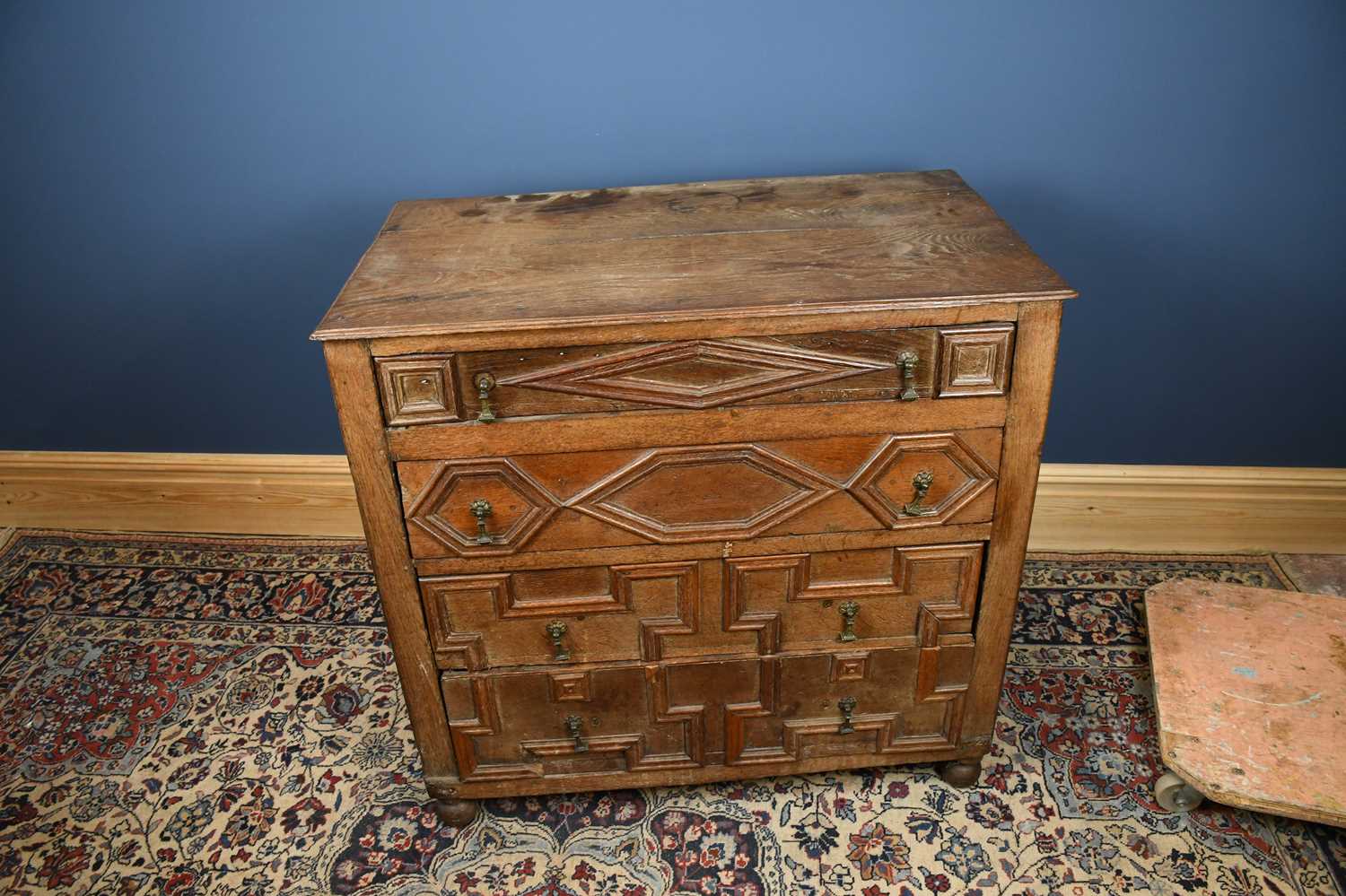 A 17th century and later oak chest, with four fielded panelled long drawers, on turned feet, - Image 3 of 5