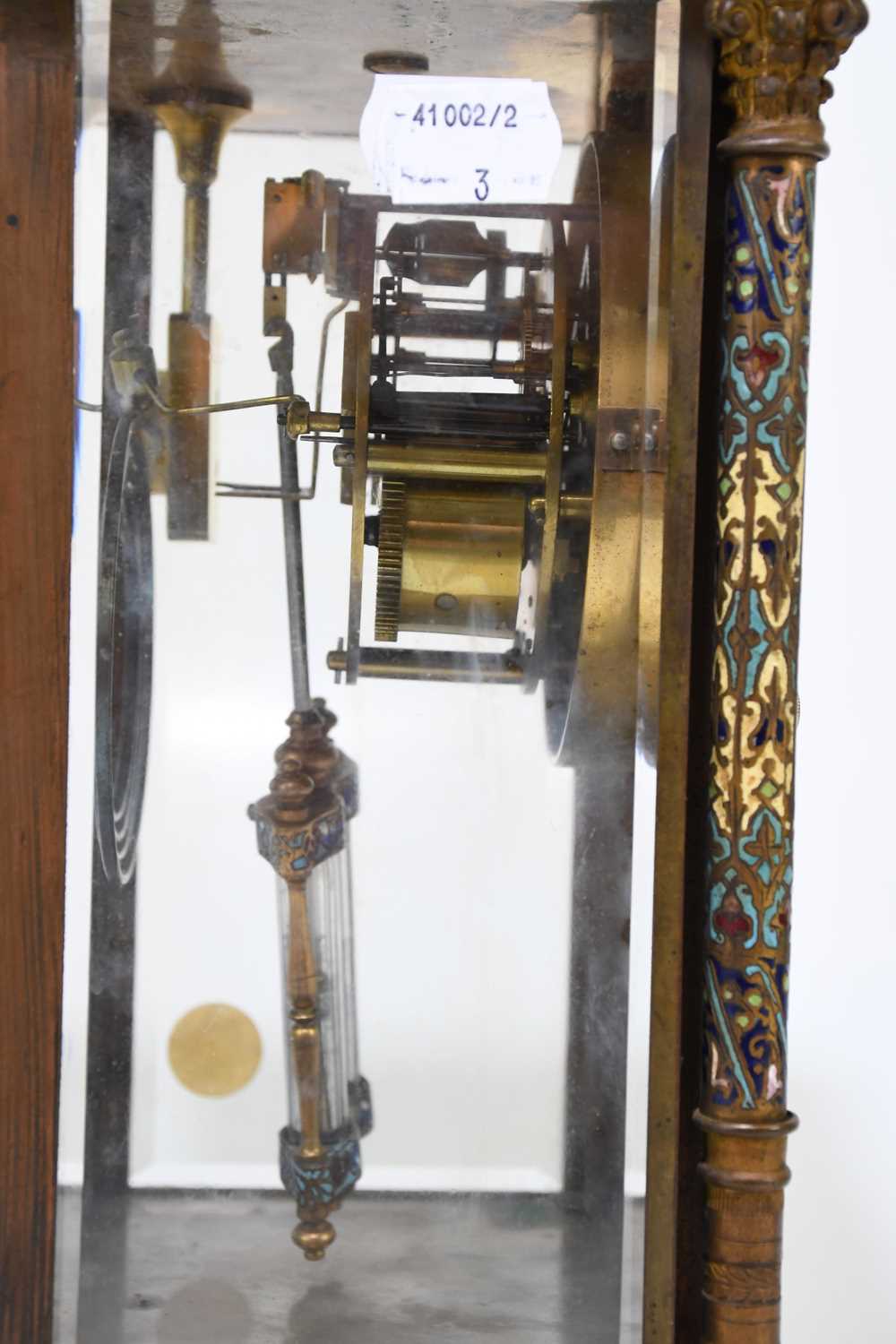 A 19th century French onyx and champleve enamel three piece clock garniture, the four glass clock of - Image 4 of 4