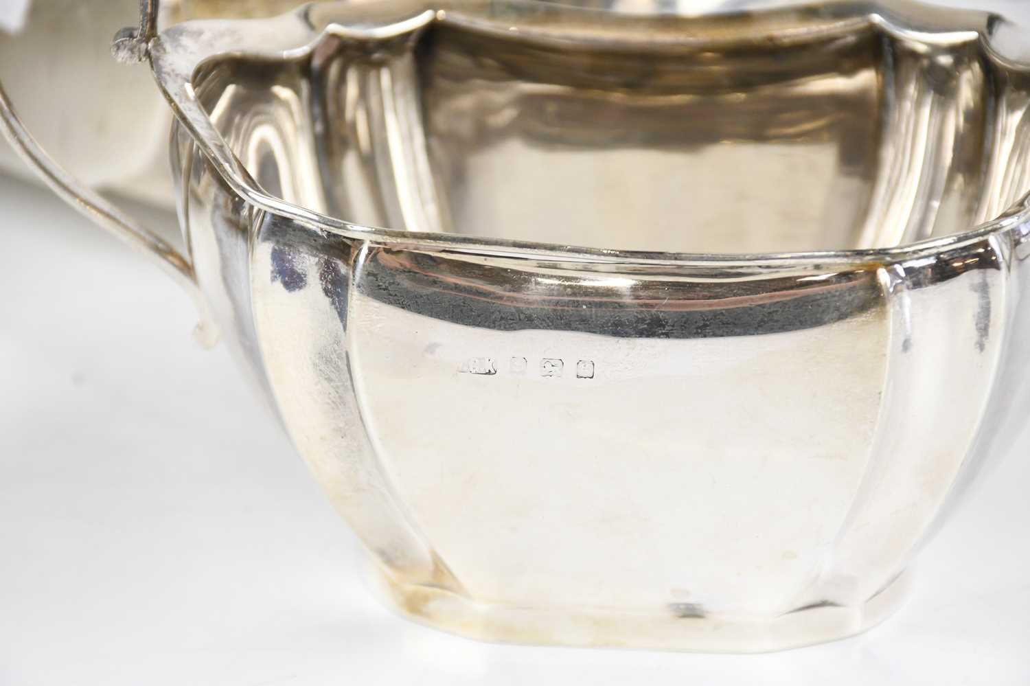 KEIGHT & CO; a hallmarked silver four piece tea service comprising teapot, water pot, milk jug and - Image 4 of 4