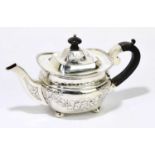 JOHN MILLWOOD BANKS; a late Victorian hallmarked silver bachelor's teapot, with repoussé floral