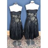 COAST; two black cotton and silk short length dresses, both unused with original tags, with an