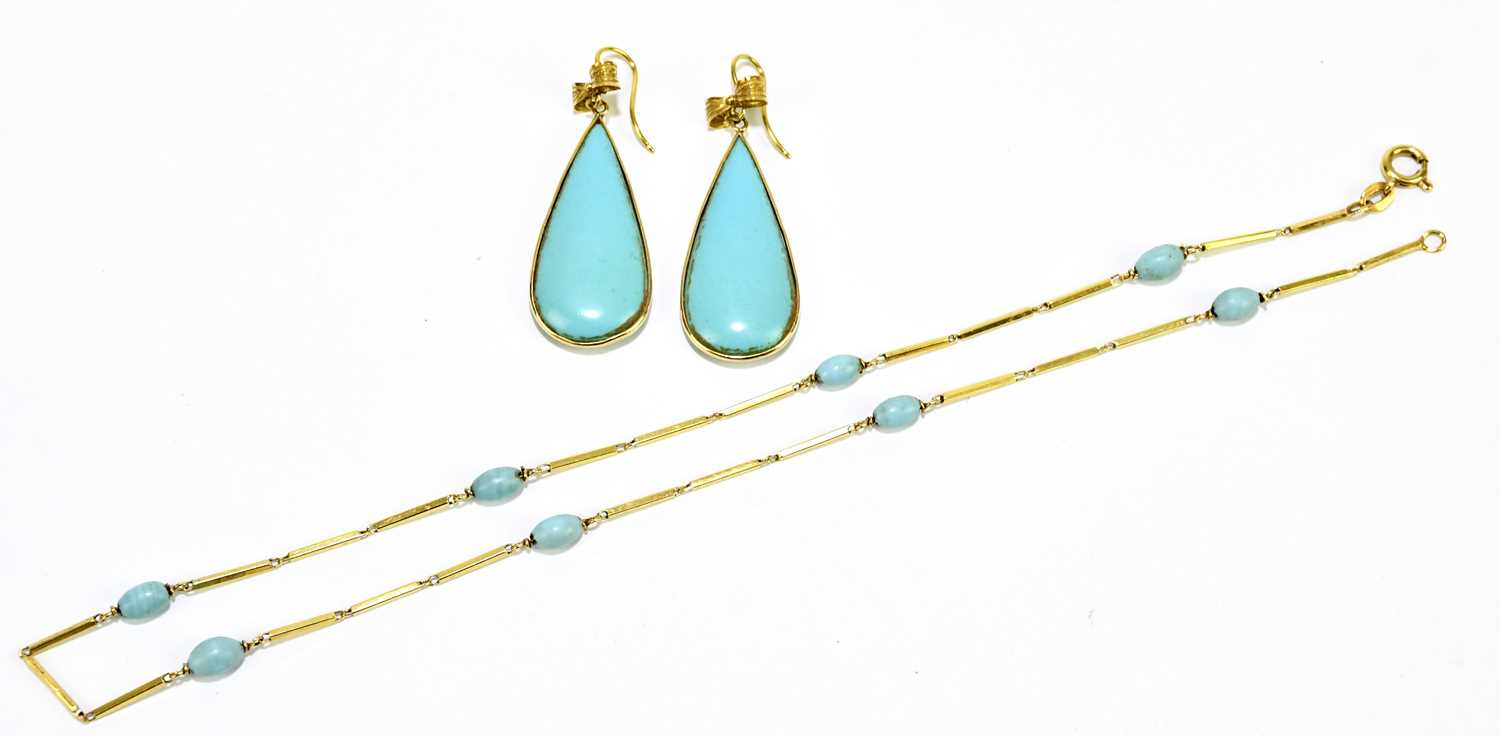 An 18ct yellow gold and turquoise bead set necklace, length approx. 41cm, and a pair of drop