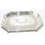 A large late 19th century silver plated gallery tray of rectangular form, with chased decoration
