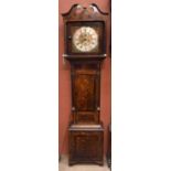 WICKSTEAD OF WOLVERHAMPTON; an oak cased eight day movement longcase clock with brass face set