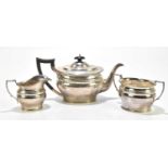 GOLDSMITHS & SILVERSMITHS COMPANY LTD; a George V hallmarked silver three piece tea service of