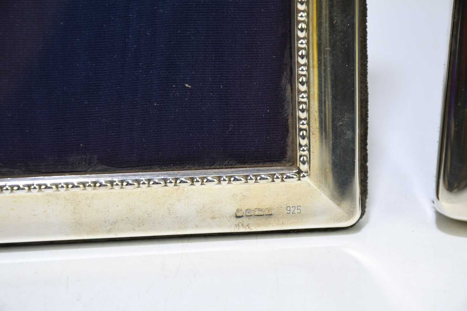 CARR'S OF SHEFFIELD; an Elizabeth II hallmarked silver mounted easel backed photograph frame, - Image 3 of 4