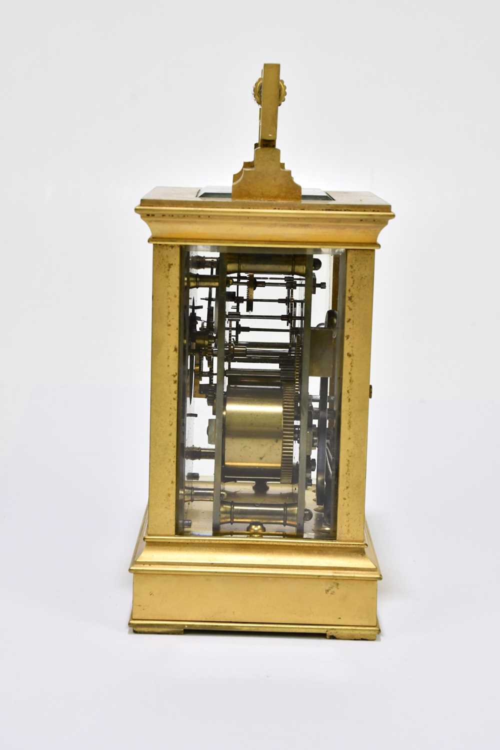 A late 19th century French brass cased carriage clock with swing loop handle above silvered dial set - Image 4 of 6