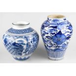 Two late 20th century blue and white vases, height of largest 26cm.