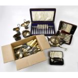 A group of electroplated items to include teapots, jugs, cutlery, etc.