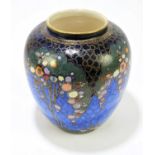 CROWN DEVON FIELDINGS; a vase of ovoid form with stylised floral decoration on a powder blue ground,