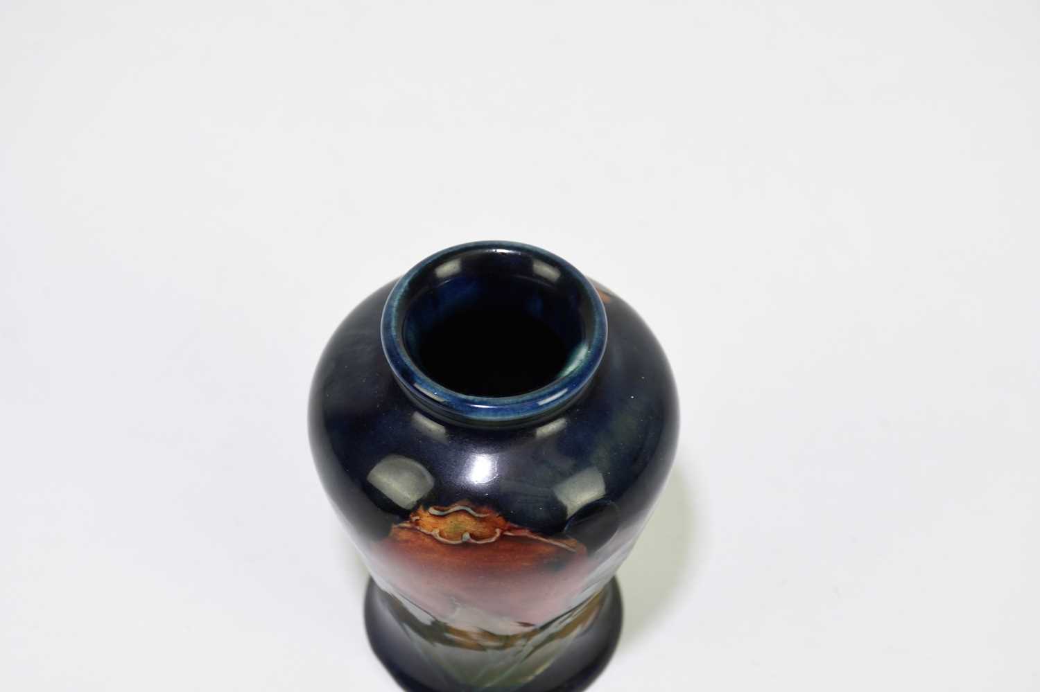 MOORCROFT; a small 'Pomegranate' pattern vase, impressed marks and impressed signature, height 8. - Image 3 of 4