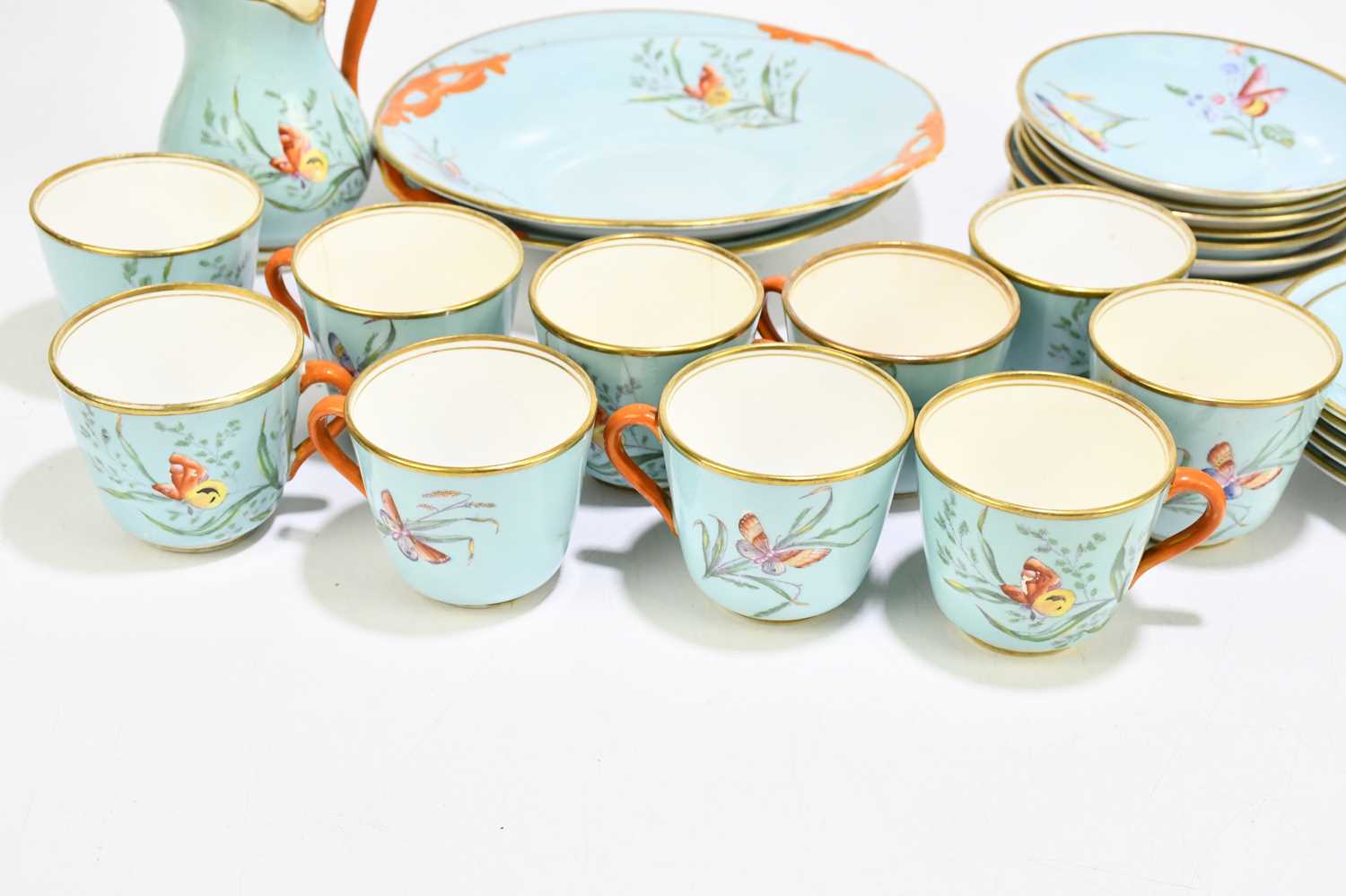 A 19th century English bone china thirty-eight piece part tea service, decorated with butterflies - Image 4 of 9