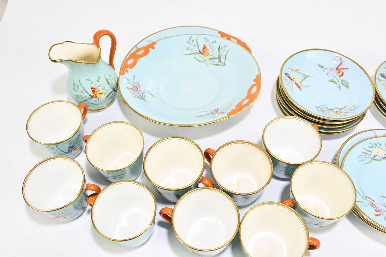 A 19th century English bone china thirty-eight piece part tea service, decorated with butterflies - Image 2 of 9