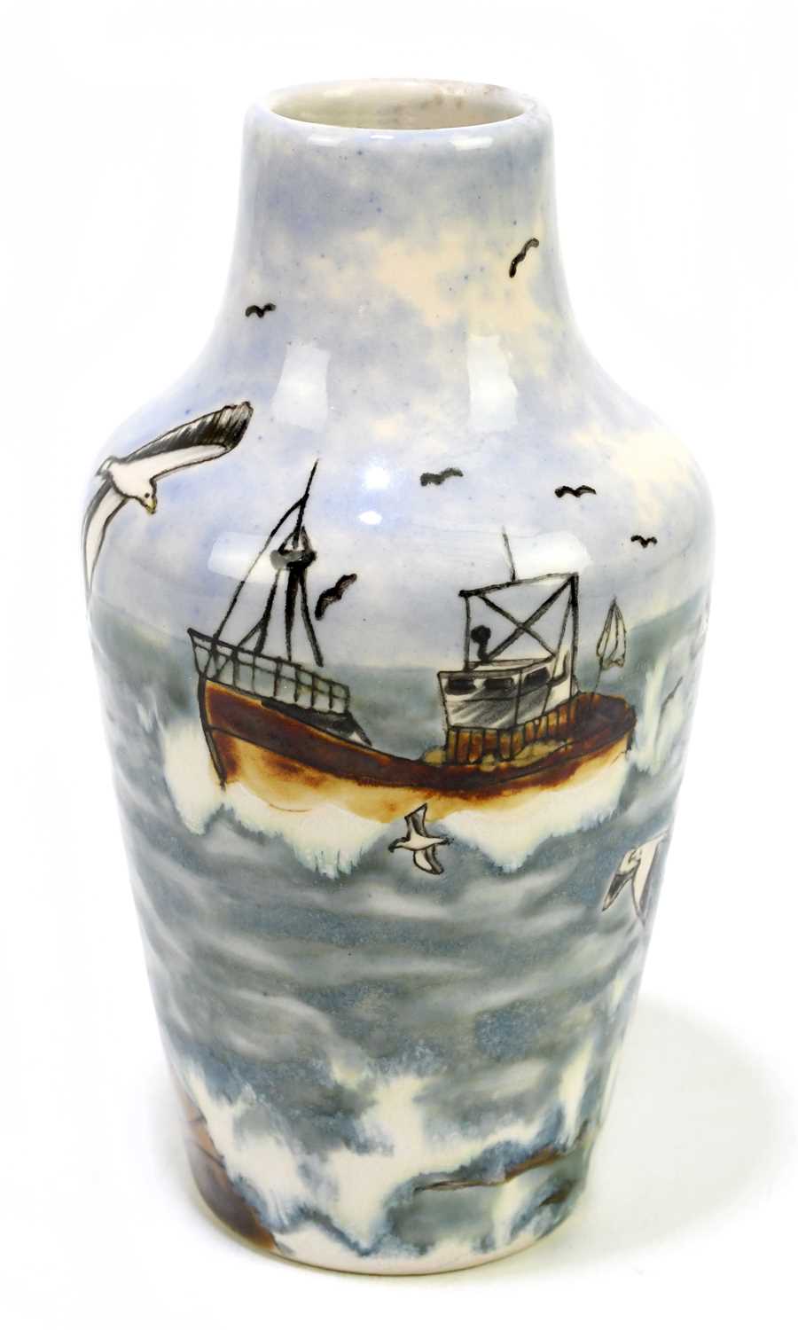 COBRIDGE STONEWARE; a vase with inverted neck decorated with trawlers and seagulls, height 17cm.