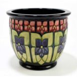 MOORCROFT; a jardinière decorated in 'Violet' pattern, impressed marks and initials to the