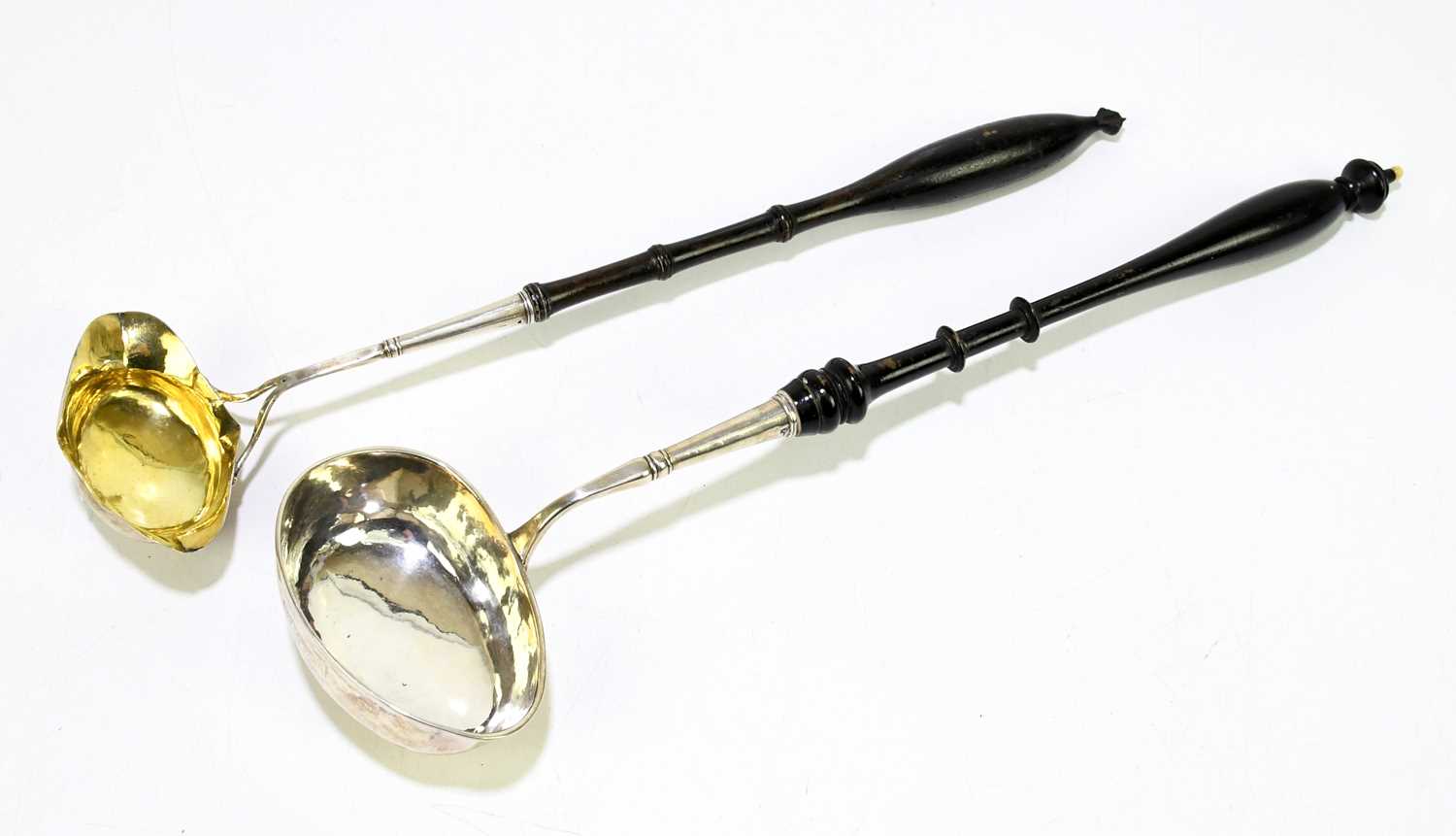A Swedish provincial silver punch toddy ladle, Jonkoping 1813 by Bengt Tellander, the gilt bowl on