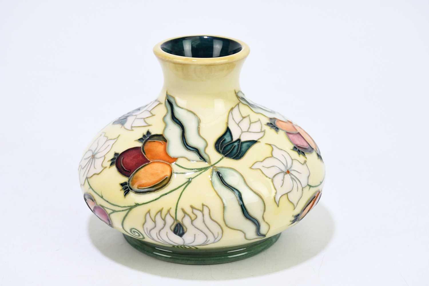 MOORCROFT; a squat vase decorated with floral sprays on an ivory ground, height 10cm.Condition - Image 2 of 6