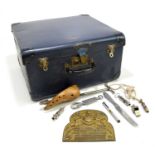 A P&O Cruises suitcase, together with a shoe tree, four whistles, a can opener and a brass plaque