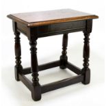 An early 20th century oak joint stool, height 45cm, depth 30cm, width approx 42cm.