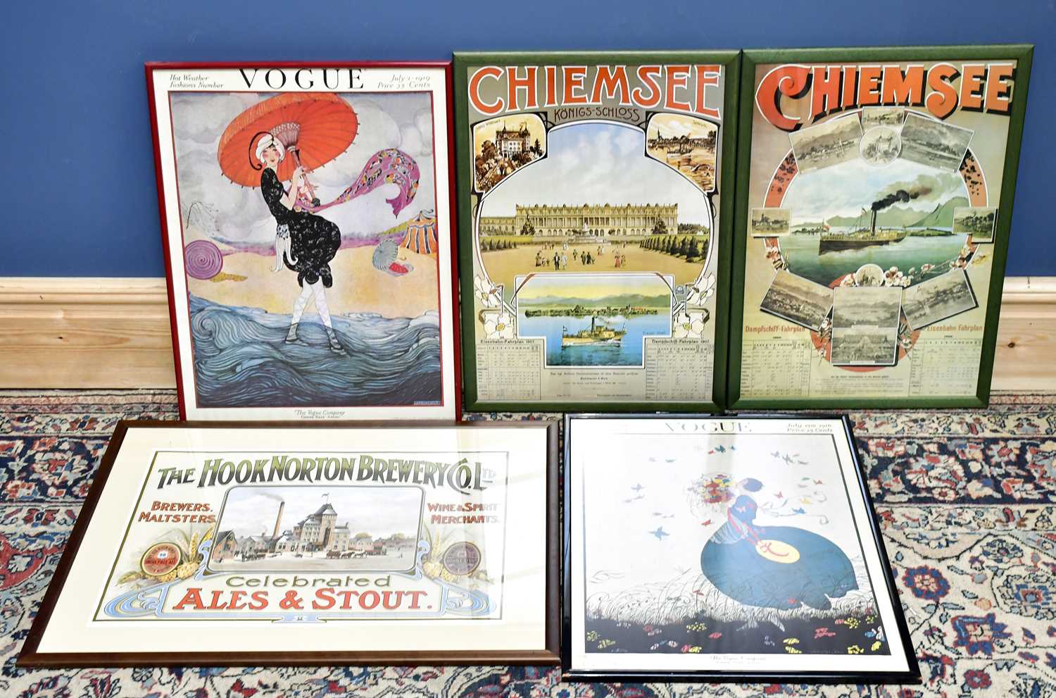 A Hook Norton brewery poster, two Chiemsee prints and two Vogue prints.