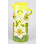SALLY TUFFIN FOR DENNIS CHINAWORKS; a cylindrical jug decorated with floral motifs on a yellow
