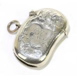 WILLIAM HAIR HASELER; a George V kidney shaped vesta case, decorated with floral decoration,
