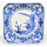 A Japanese Meiji period blue and white square section dish, with lobed corners, character mark to